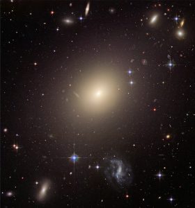 There are different types of galaxies: Milky Way is a spiral galaxy, the galaxy on the picture, ESO 325-G004, is an elliptical one.